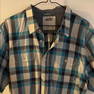 Vans button down.  Short sleeve glad.  Taper fit great look.